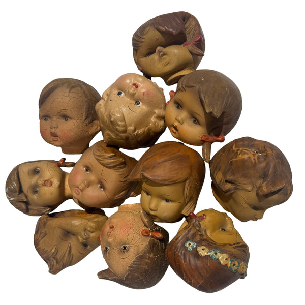 Collection of antique doll heads