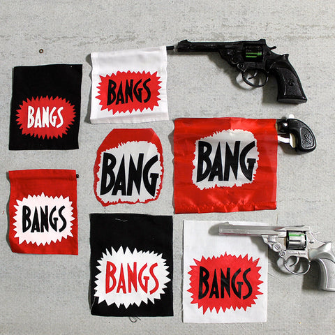 Toy Gun with Bang Sign